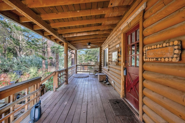 wooden terrace featuring a porch