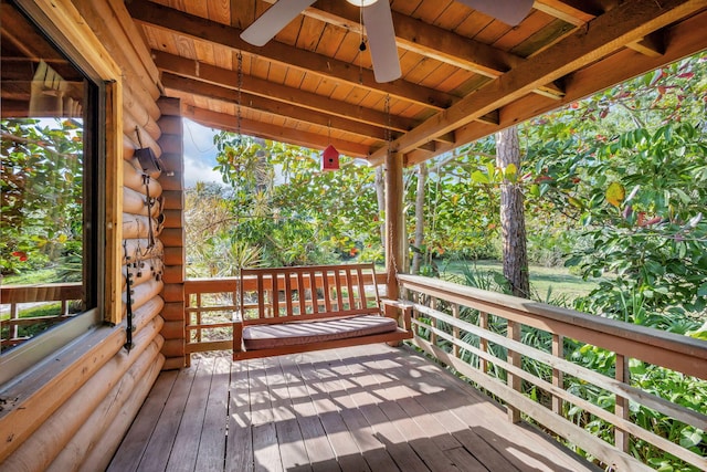 wooden terrace with ceiling fan