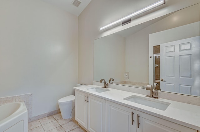 full bathroom with tile patterned flooring, vanity, independent shower and bath, and toilet