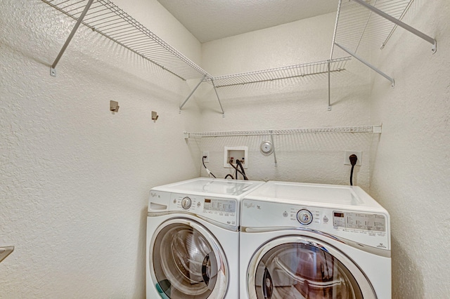 laundry room featuring independent washer and dryer