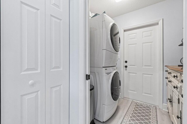 full bathroom with shower / tub combo, backsplash, vanity, tile patterned floors, and toilet