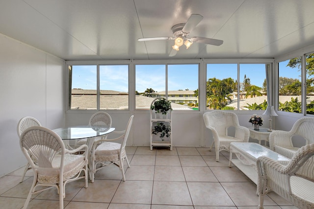 sunroom / solarium with ceiling fan