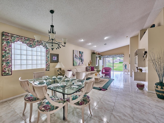 dining room with vaulted ceiling, light tile patterned flooring, a textured ceiling, and an inviting chandelier