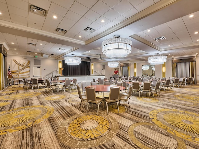 dining area with ornamental molding and light colored carpet