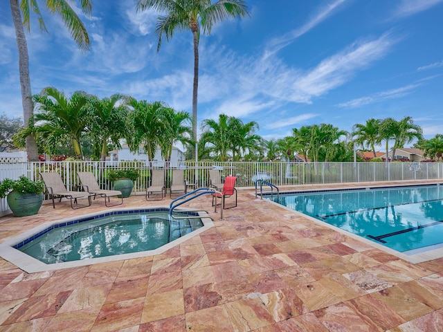 view of swimming pool featuring a patio area