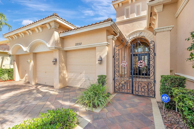 entrance to property featuring a garage