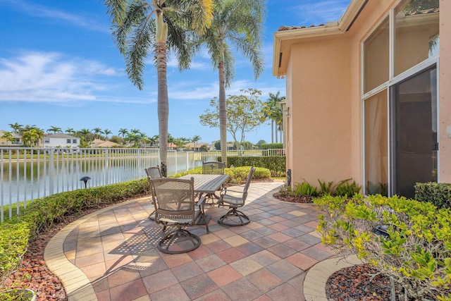 view of patio / terrace featuring a water view