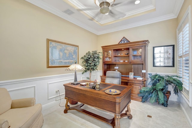 home office with ornamental molding, a raised ceiling, ceiling fan, and light tile patterned flooring