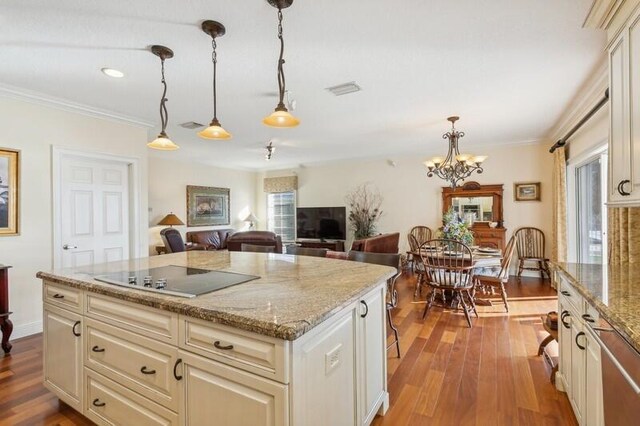 kitchen with stainless steel dishwasher, sink, decorative backsplash, and stone counters