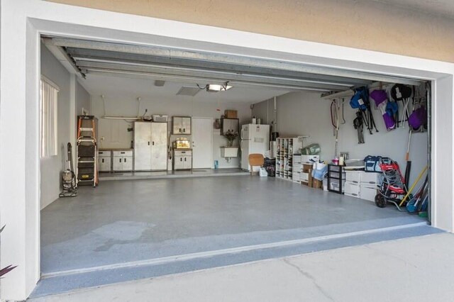 view of front property with a garage and a lawn