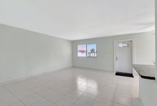 foyer with light tile patterned floors