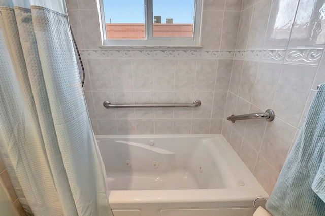 bathroom featuring shower with separate bathtub