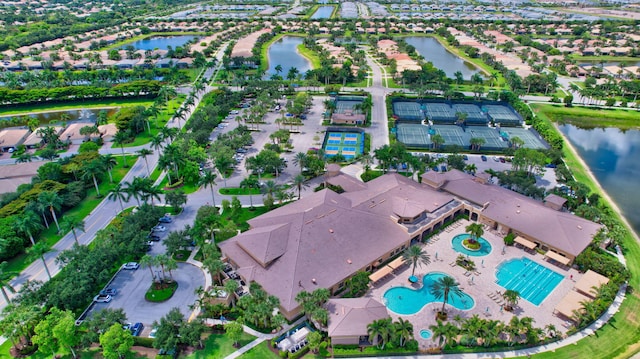 aerial view with a residential view and a water view