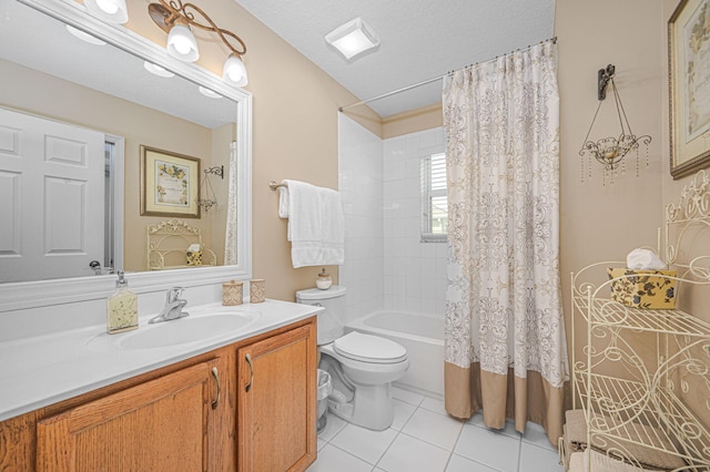 full bathroom featuring tile patterned flooring, vanity, a textured ceiling, toilet, and shower / bath combo with shower curtain