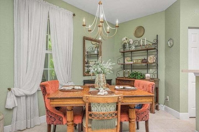 dining space featuring an inviting chandelier and light tile patterned flooring