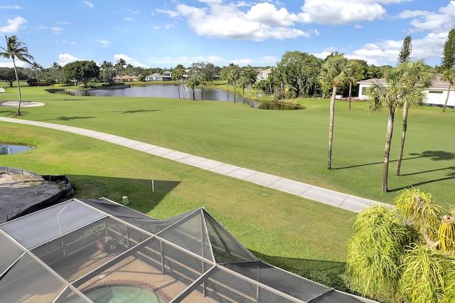 surrounding community featuring a water view and a yard