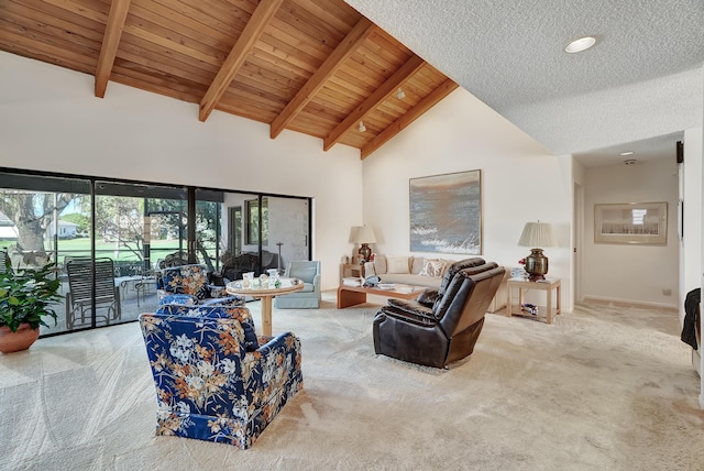 carpeted living room featuring beam ceiling, high vaulted ceiling, and wooden ceiling