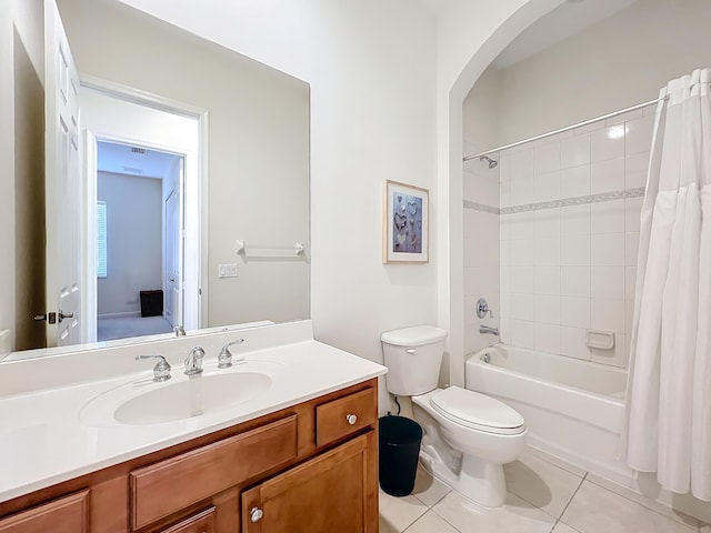 full bathroom featuring tile patterned flooring, vanity, shower / tub combo, and toilet