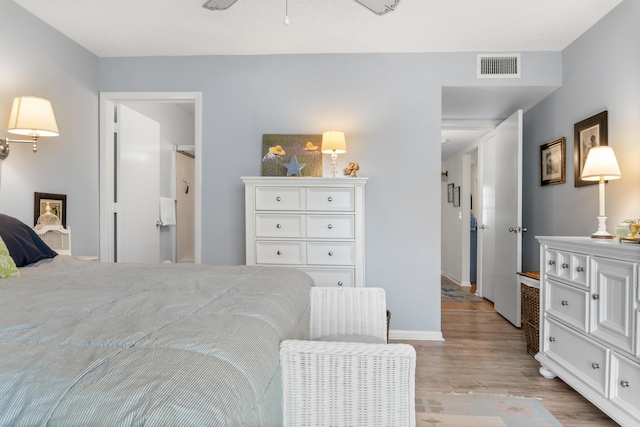 bedroom featuring light hardwood / wood-style floors