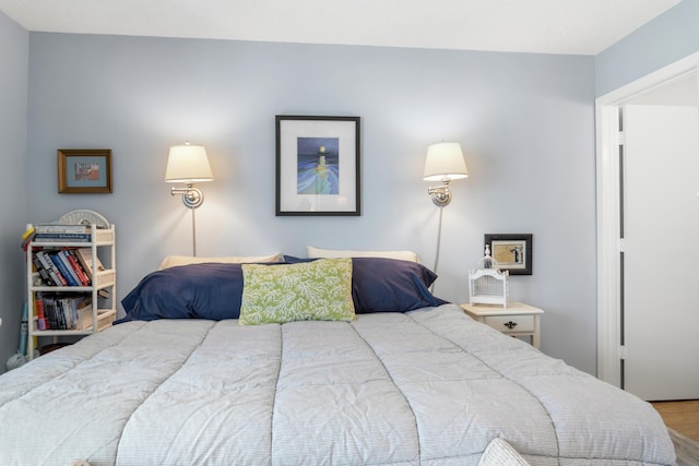 bedroom with wood-type flooring