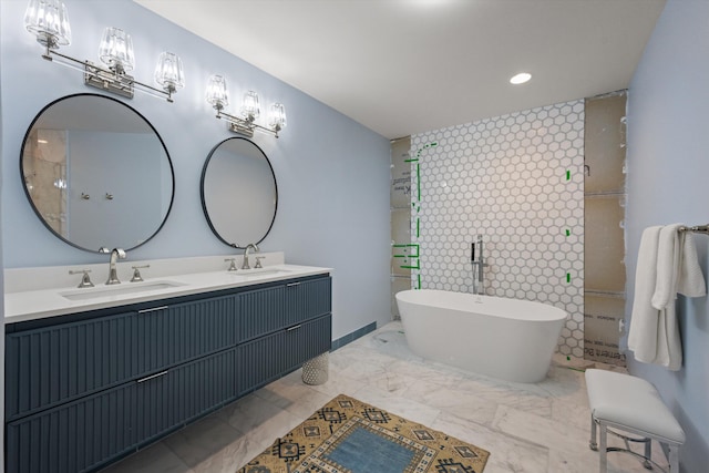 bathroom featuring vanity and a bathtub