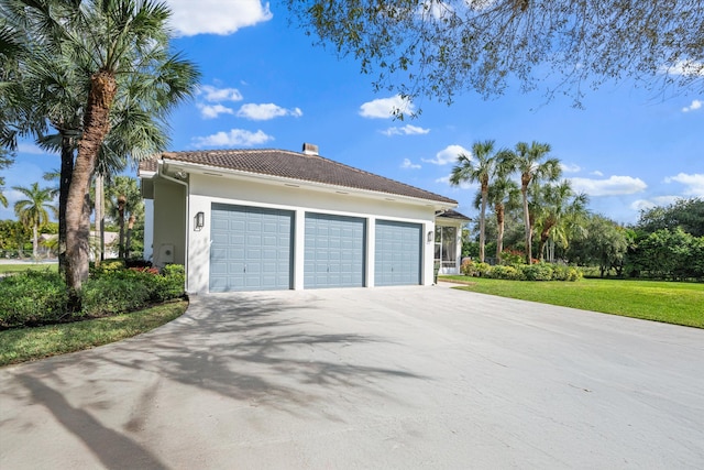 garage with a yard