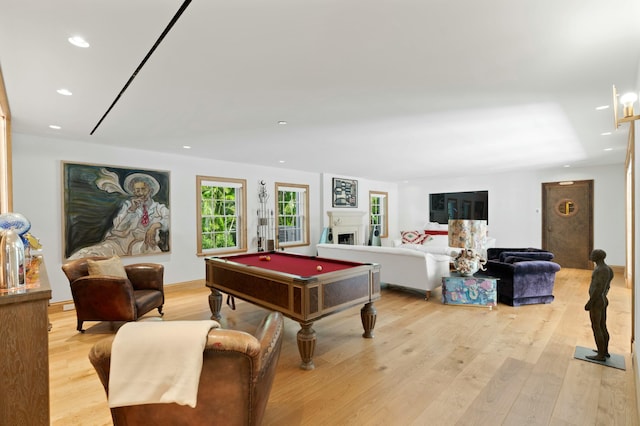 game room featuring light hardwood / wood-style floors and billiards