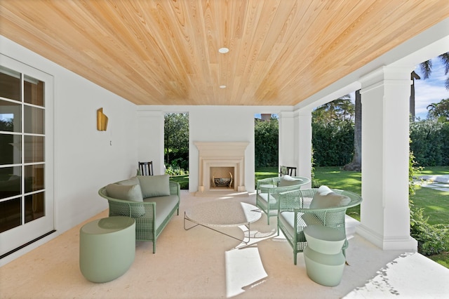 view of patio / terrace with an outdoor fireplace