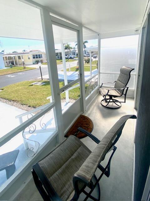 sunroom featuring a wealth of natural light