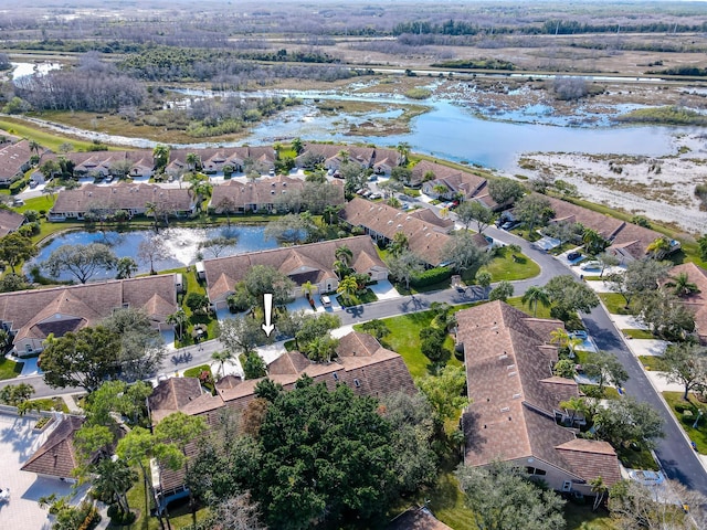 drone / aerial view featuring a water view