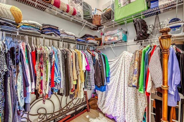 walk in closet featuring hardwood / wood-style floors