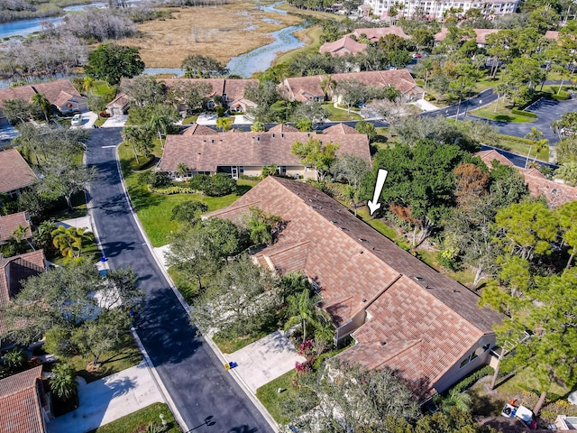 bird's eye view with a water view