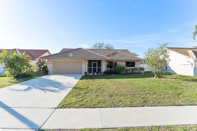 single story home with a garage and a front yard