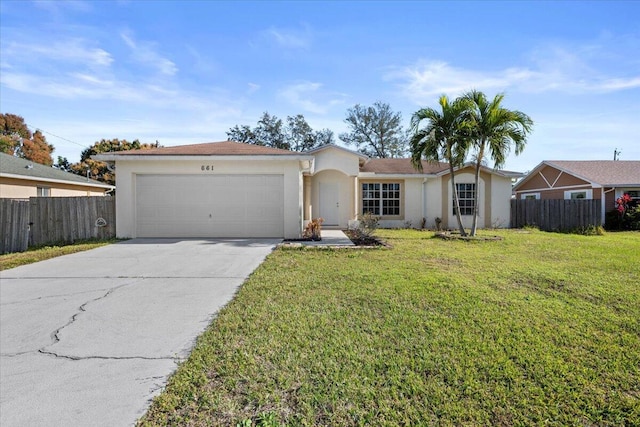 ranch-style home featuring a garage and a front lawn