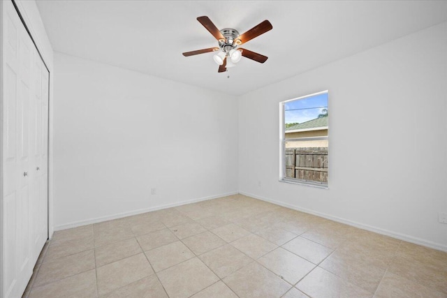 spare room featuring ceiling fan