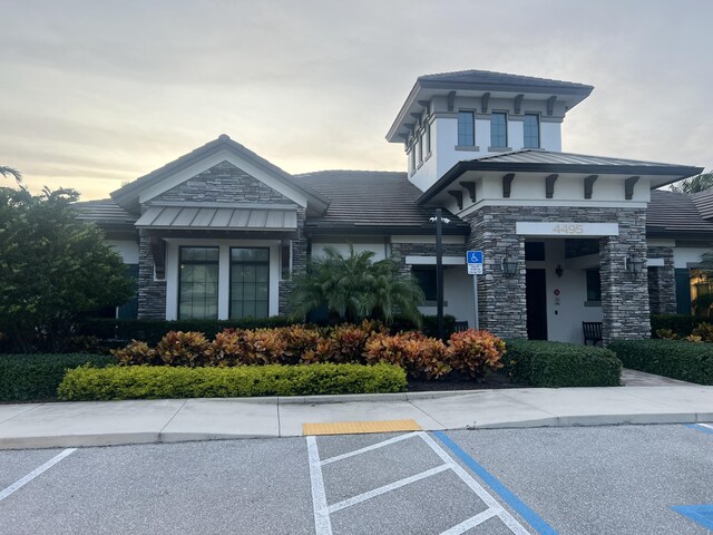 4582 San Fratello Cir, Lake Worth, FL 33467 - property at dusk with uncovered parking