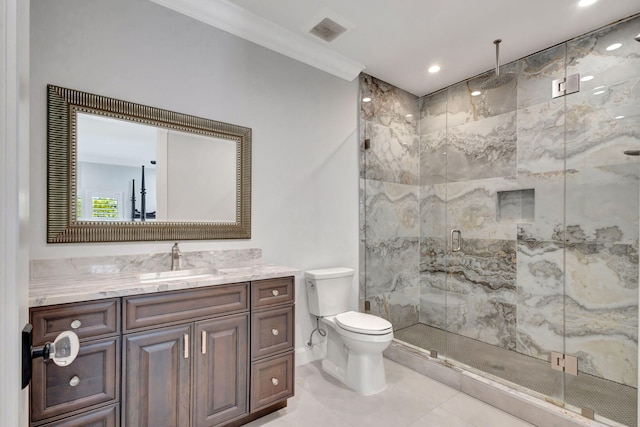 bathroom with ornamental molding, toilet, a shower with shower door, and vanity