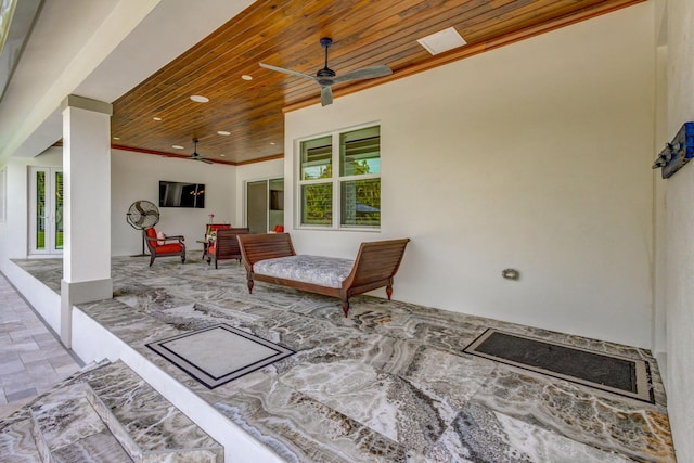 view of patio / terrace featuring french doors and ceiling fan