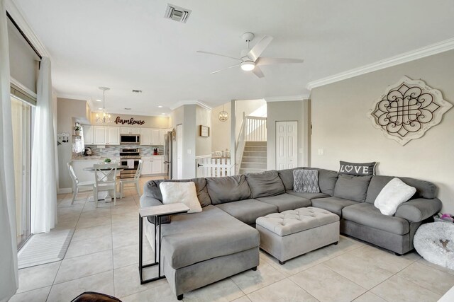 dining area with an inviting chandelier, light tile patterned floors, and a high ceiling