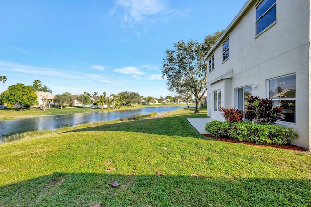 view of yard with a water view