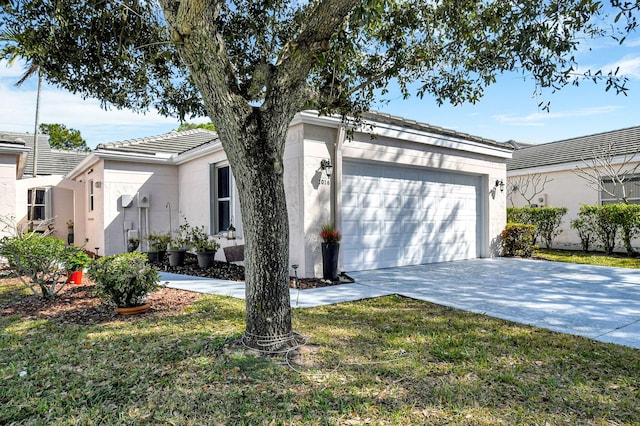 view of front of home with a garage and a front yard