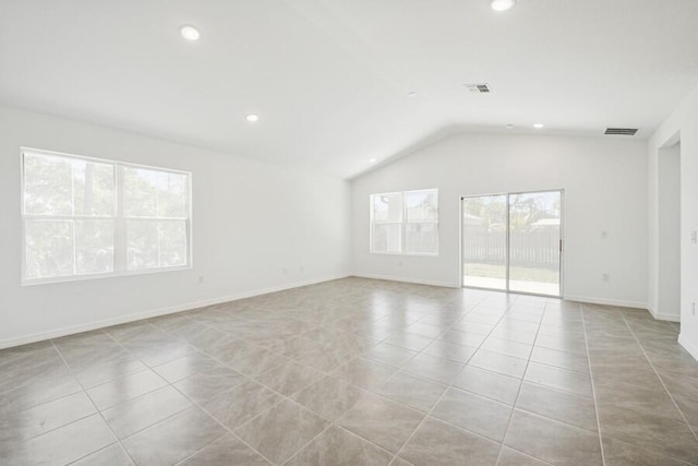 tiled spare room with recessed lighting, visible vents, lofted ceiling, and baseboards