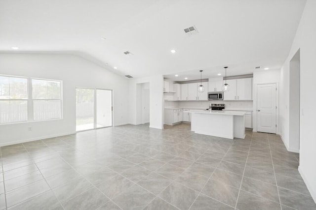 unfurnished living room with vaulted ceiling, recessed lighting, visible vents, and baseboards