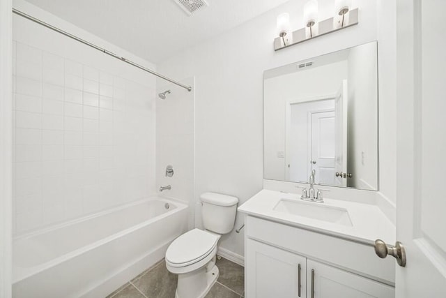 bathroom featuring visible vents, toilet, tile patterned floors, vanity, and  shower combination