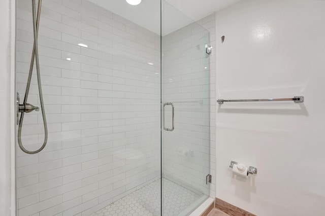 bathroom featuring an enclosed shower