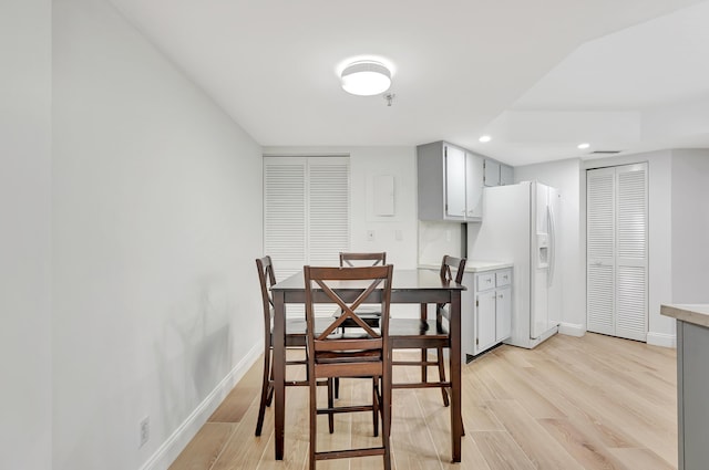 dining room featuring light hardwood / wood-style floors