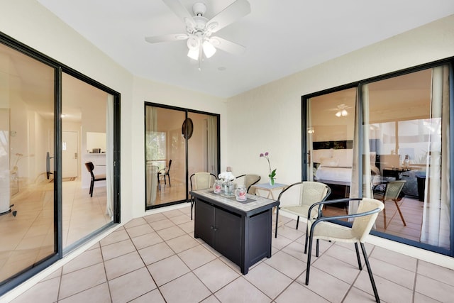 office area featuring ceiling fan and light tile patterned floors