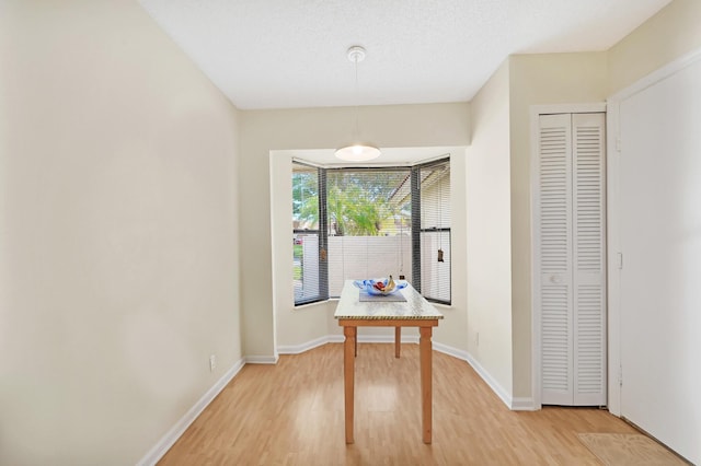 dining room featuring wood-type flooring