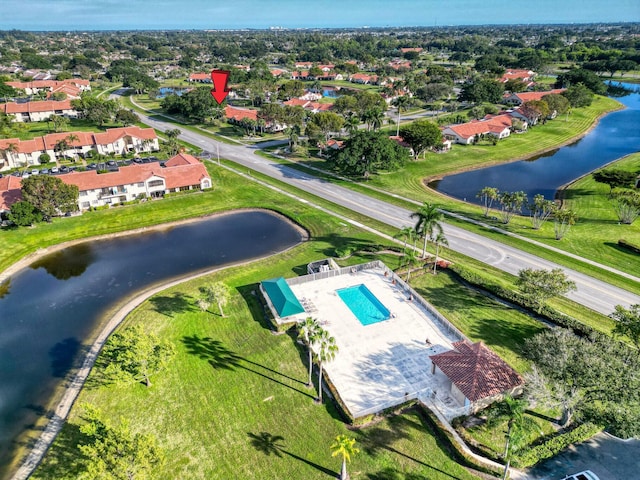 birds eye view of property featuring a water view