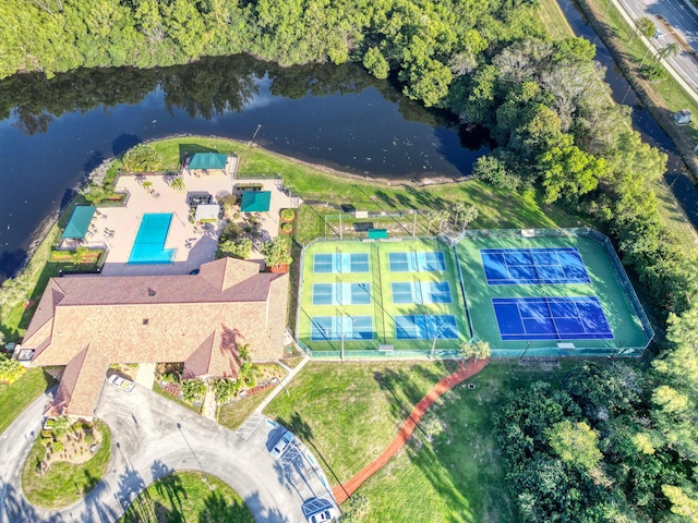 birds eye view of property featuring a water view